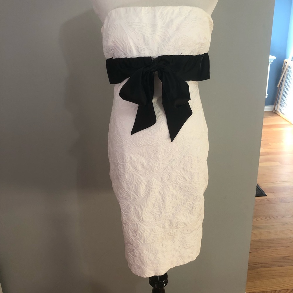 White strapless dress with black bow